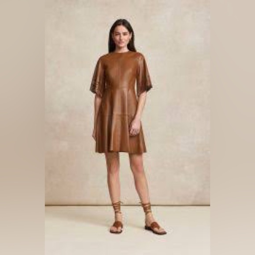 Pearl by Lela Rose laser cut sleeves lamb leather dress